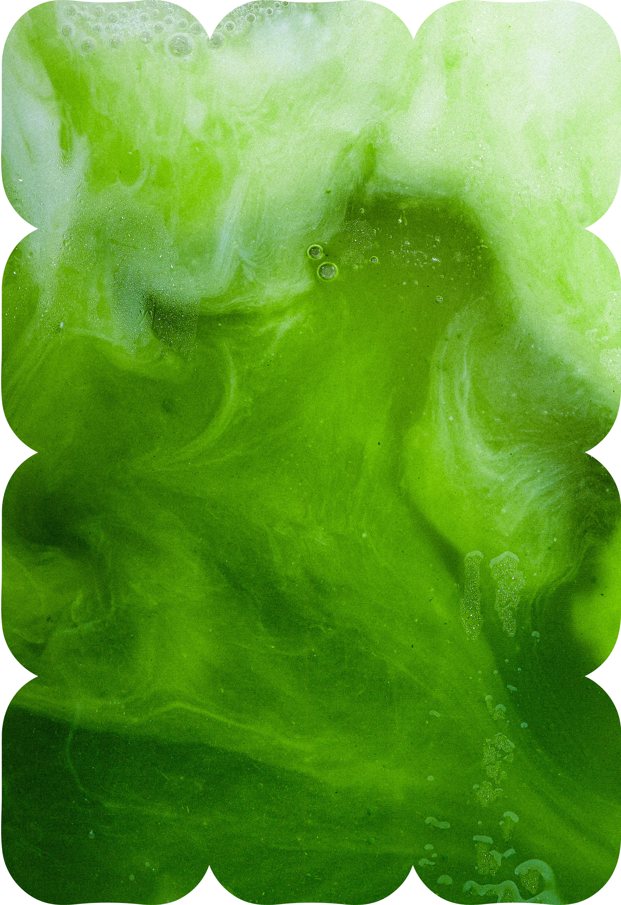 Close-up abstract swirl of vibrant green matcha mixing in liquid